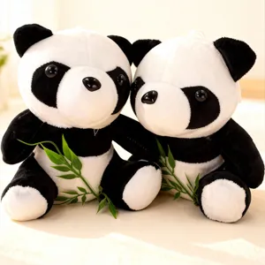 Cute pair of panda plush toys, soft stuffed animal dolls with bamboo decor for wedding and gifts.