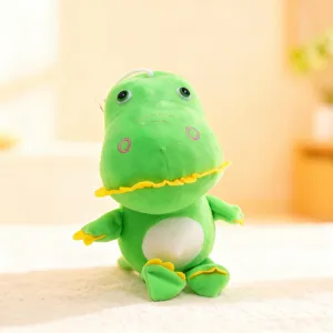 Cute green dinosaur plush toy detail shot, soft plush claw machine doll with cute face.
