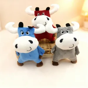 Detailed view of cute cartoon bull plush toys in blue, red, and grey. Perfect kids gift.