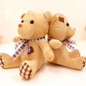 Süßes Plüsch Teddybär Spielzeug, weiche Stofftier Puppe mit Karom Schleife, ideales Geschenk.