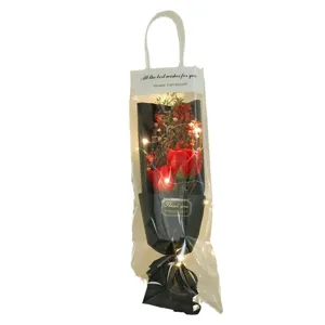 Sacchetto regalo con bouquet di rose artificiali e luce LED, bellissimo regalo.