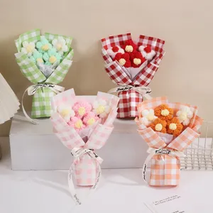 Handmade crochet flower bouquet with plaid wrapping paper, cute gift for Valentine's Day.