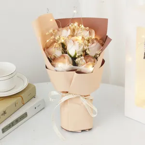 Artificial soap rose bouquet with fairy lights and gypsophila gift for valentine day.
