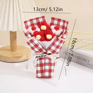 Handmade crochet flower bouquet detail view, featuring red white plaid wrapping and cute ribbon.