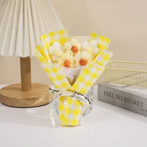 Handmade knitted puff flower bouquet in yellow plaid wrapping, perfect cute gift for occasions.
