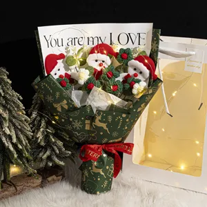 Handmade knitted crochet Santa Claus flower bouquet as a perfect Christmas gift and holiday decor.