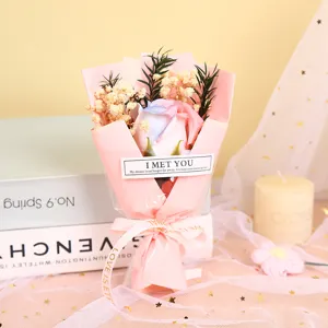 Mini soap rose bouquet with gypsophila, pink wrapping and ribbon, perfect Valentine gift.