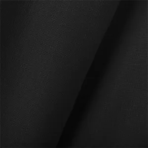 Close-up detail view of black textured fabric showing premium weave pattern and soft finish.