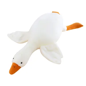 Cute white goose plush toy lying pillow, soft stuffed animal comforting doll for kids.