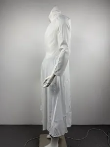 White long suit coat side detail showing the stand collar, slim waist and A-line hem.