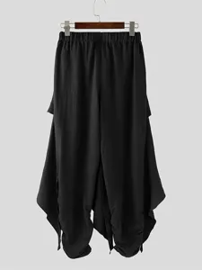 Men's black harem pants with draped layered panels, loose casual streetwear trousers.