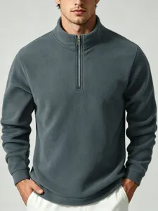 Men's dark green fleece quarter-zip pullover sweatshirt, casual stand collar warm winter top.
