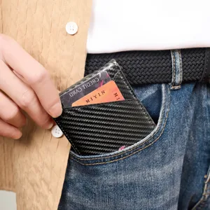 Minimalist carbon fiber card holder for men, ultra-thin slim wallet with multiple slots.