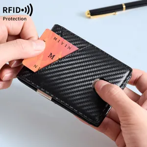 Detailed view of carbon fiber minimalist RFID blocking card holder wallet for men.