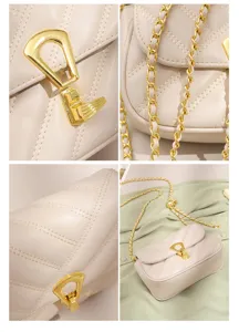 Close-up details of the elegant chevron quilted shoulder bag featuring premium gold hardware.