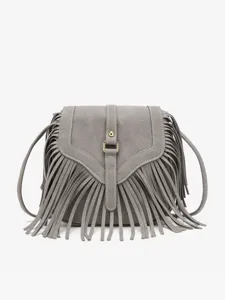 Grey suede fringe crossbody bag for women, retro bohemian shoulder handbag with clasp.