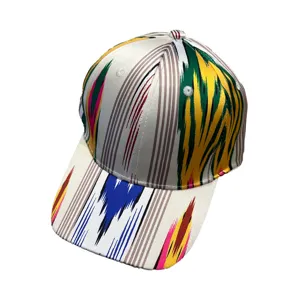 Ethnic style Ikat pattern baseball cap for women, vibrant multi-color striped travel hat detail.