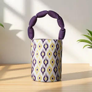 Ethnic style Atlas pattern bucket handbag detail view, featuring unique purple handle for gift.