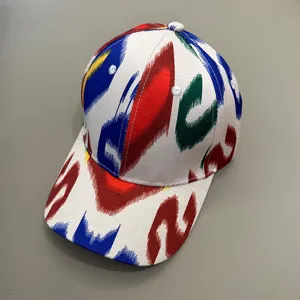 Colorful printed baseball cap with stylish brush design, perfect for casual outdoor wear and travel.