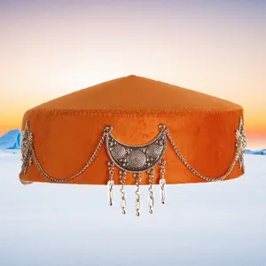 Detail view of a traditional Kazakh velvet hat featuring exquisite silver crescent and chain ornaments.