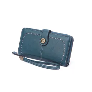Vintage blue long women wallet with zipper, wrist strap and elegant hollowed out design.