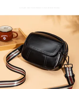 Black PU leather crossbody bag with striped web strap, vintage retro triple-layer design, chic daily purse.