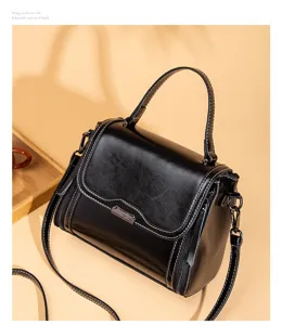 Classic black retro women handbag, stylish top-handle crossbody bag with spacious capacity.