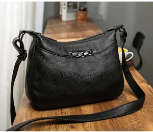 Black litchi pattern leather shoulder bag for women, stylish daily commuting handbag.