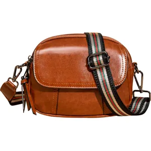 Vintage brown leather crossbody bag for women, stylish multi-layer casual shoulder handbag.