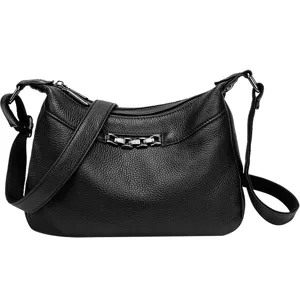 Black litchi pattern leather shoulder bag for women, stylish commuter crossbody handbag.