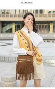 Vintage bohemian fringe shoulder bag for women, stylish suede crossbody purse with metal studs.