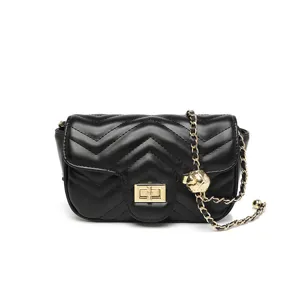 Black quilted leather crossbody bag with chic chevron pattern, gold tone hardware and chain strap.