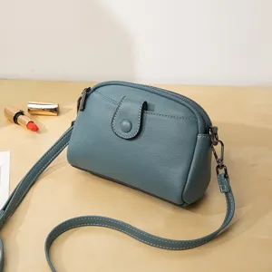 Stylish minimalist blue-grey women crossbody bag with double layers and adjustable strap.