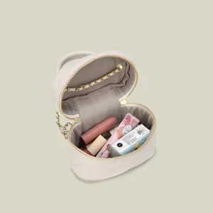 Stylish quilted chain makeup bag for women, minimalist solid color large capacity bag.