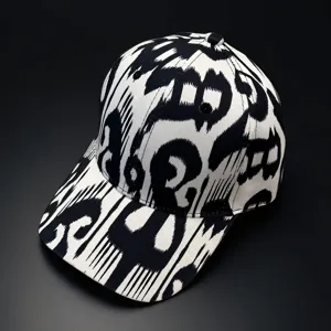 Close-up detail shot of the black and white ethnic pattern fabric and curved brim.