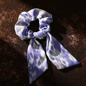 Purple ikat print fabric hair scrunchie with long ribbons ethnic style bow hair tie detail view