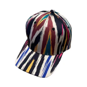 Ethnic ikat patterned baseball cap detail showing vibrant multicolored vertical stripes.