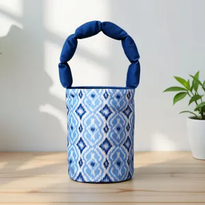 Ethnic style blue Atlas silk bucket bag with unique padded handle for cultural gifts.
