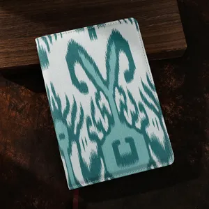 Cubierta de cuaderno de tela estilo étnico Xinjiang con patrón verde blanco y marcapáginas.