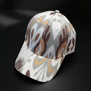 Ethnic ikat pattern baseball cap detail shot, showing unique brushstroke texture and premium fabric.