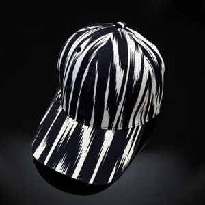 Detailed close-up of a black and white abstract pattern baseball cap for daily wear.