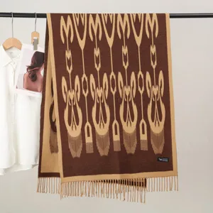 Detailed view of the elegant ethnic style knitted winter scarf featuring classic patterns and fringe design.
