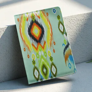Cuaderno cultural étnico de Xinjiang y funda de pasaporte con patrón ikat tradicional brillante.