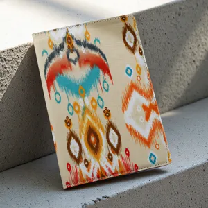 Cuaderno de estilo étnico con patrón Ikat vibrante, diario portátil para viajes y notas.