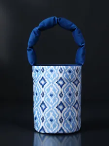 Ethnic style fabric bucket bag with traditional blue and white geometric pattern and soft handle.
