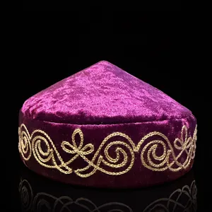 Traditional Kazakh velvet embroidered skullcap featuring exquisite gold thread patterns.