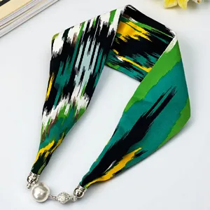 Exquisite Xinjiang style narrow silk scarf with vibrant abstract pattern and magnetic pearl clasp.