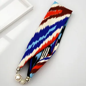 Xinjiang ethnic geometric print long scarf with magnetic pearl buckle accessory for women.