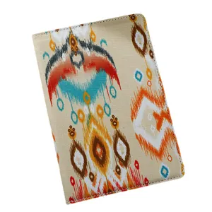 Xinjiang ethnic style fabric notebook featuring vibrant traditional ikat patterns and neat stitching.