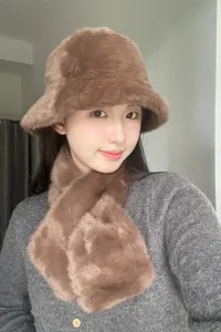 Detailed view of the winter plush bucket hat and matching furry scarf set in cozy brown.